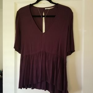 deep purple open-back peplum blouse